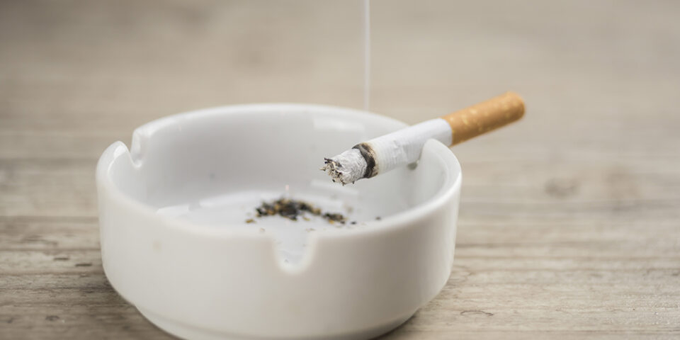 Cigarette in ash tray